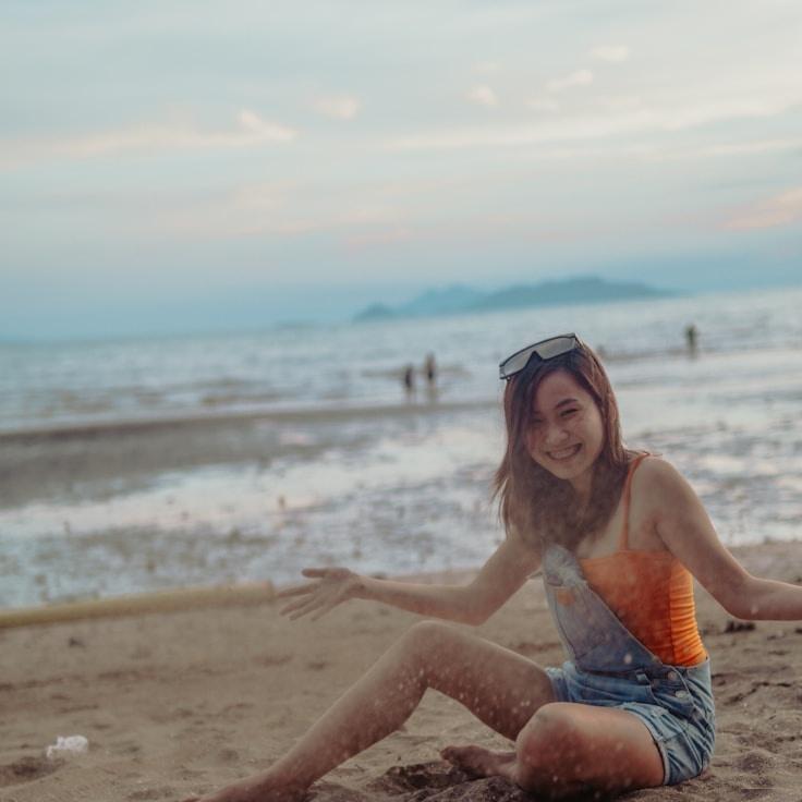 Kaveri Mehta, Lead Design Curator at LevelRouteParcel, reviewing corporate floral arrangements